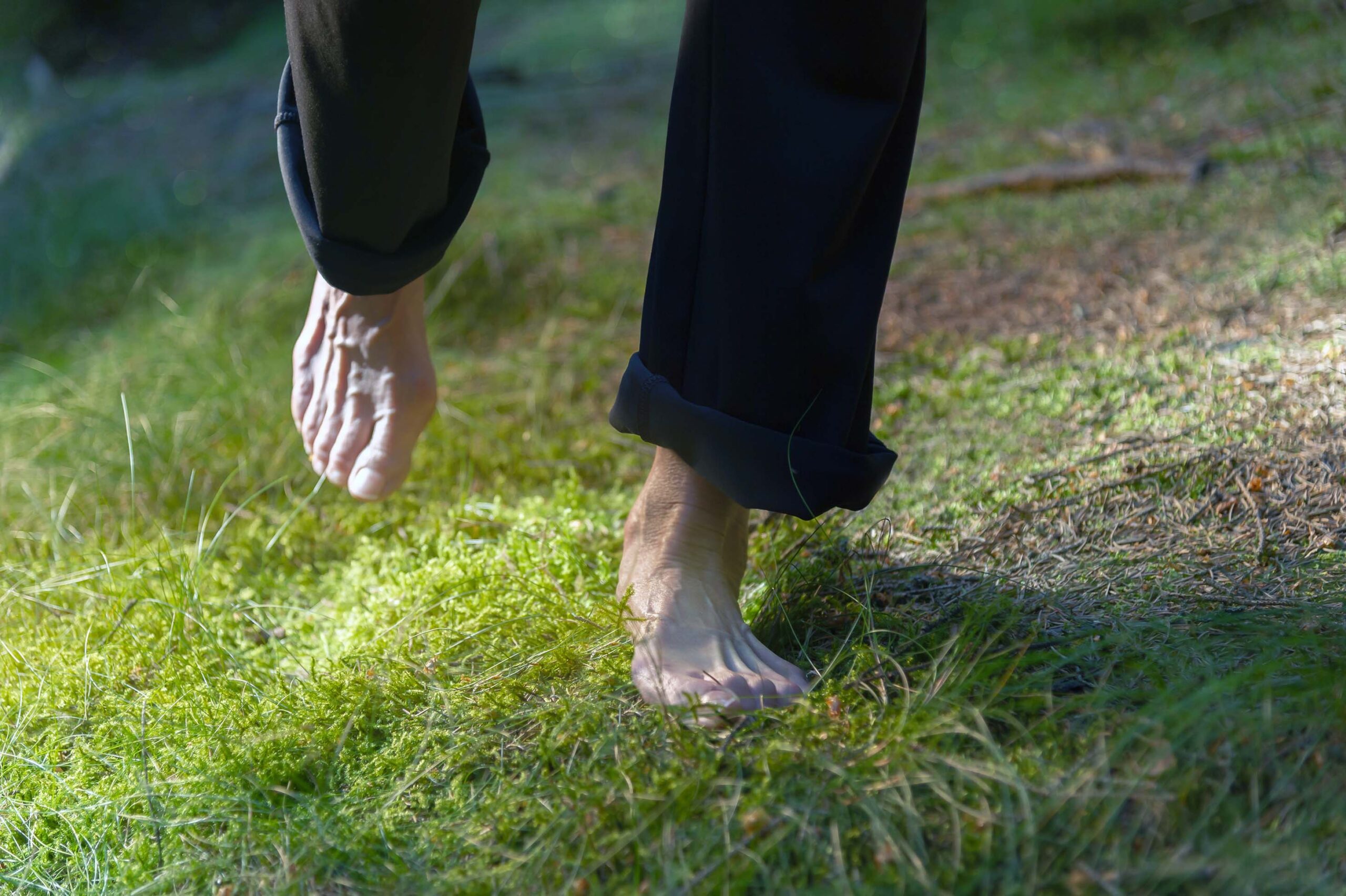 walking barefoot in the grass