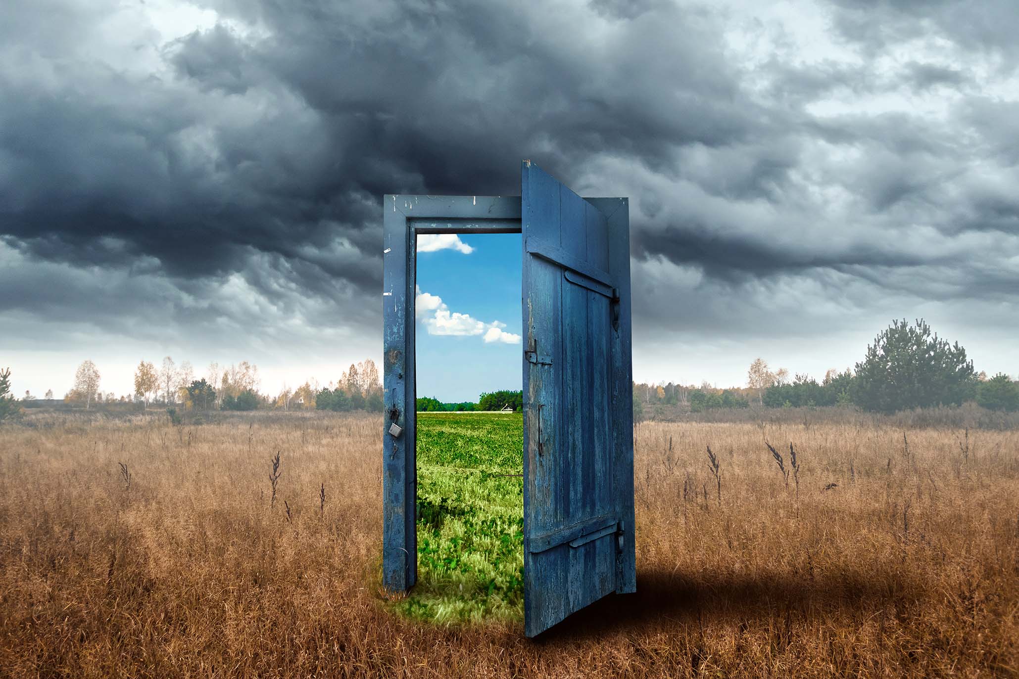 open door set in a field